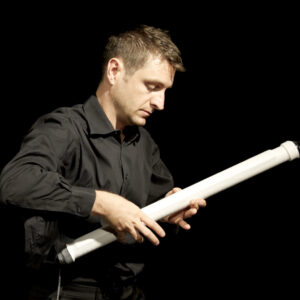 D. Andrew Stewart performing with a Soprano T-Stick 2GG.